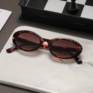 Sunglasses: Vogue Feline
