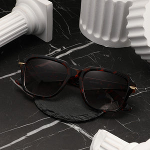 Sunglasses: Audacio