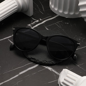 Sunglasses: Charma Finesse