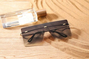 Sunglasses: Uno Pezzo