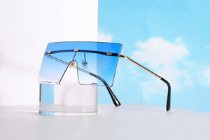 Sunglasses: Uno Pezzo