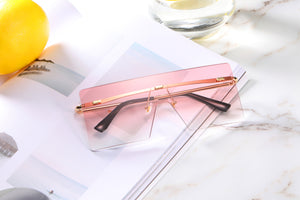 Sunglasses: Uno Pezzo