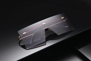 Sunglasses: Uno Pezzo